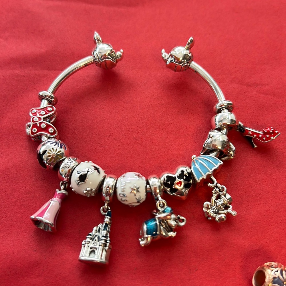 Pandora Disney Themed bangle bracelet with 11 charms.